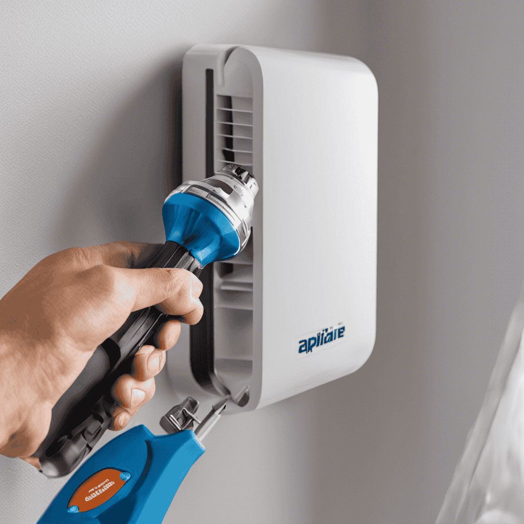 An image showcasing a hand holding a screwdriver, positioning an Aprilaire Air Purifier against a wall